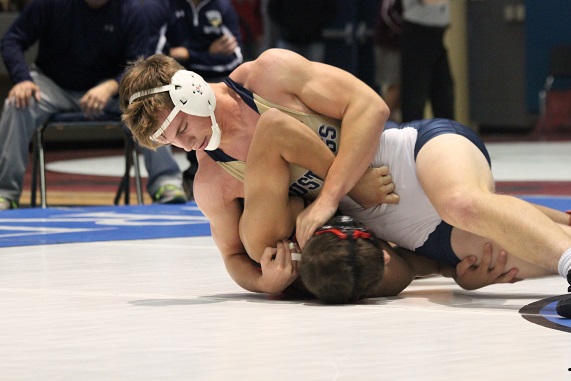 Jackson Brock dominates his opponent in a pinning combination.