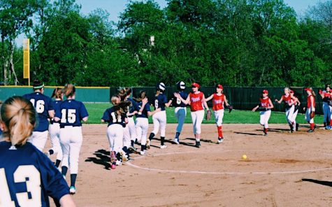 The girls shake hands after their last game of the season against Prince of Peace.