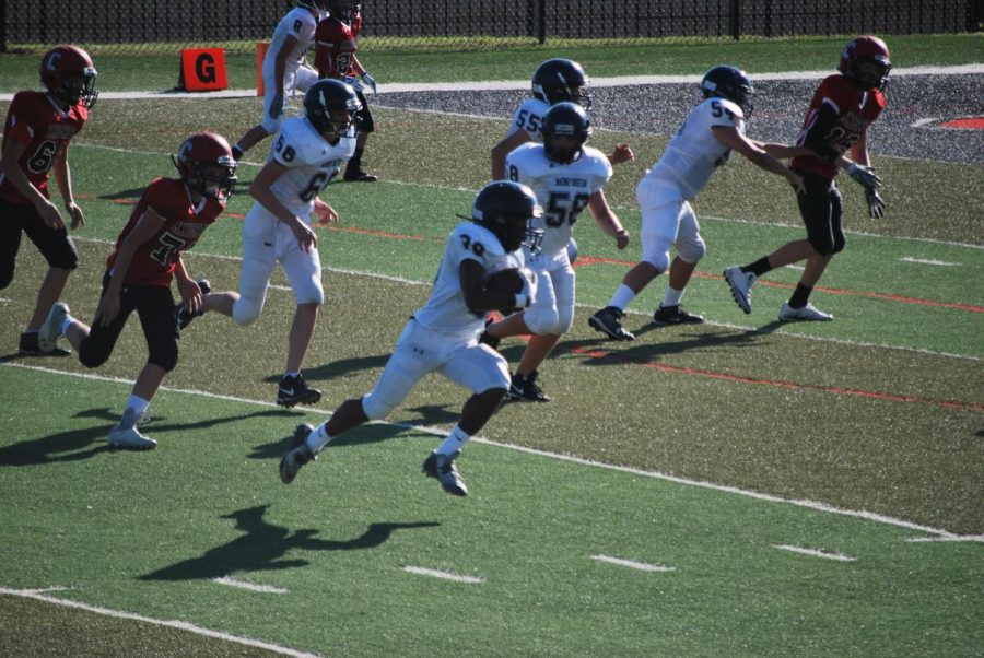 Jay Thompson, eighth grader, ran into the end zone scoring another touchdown for MCA.