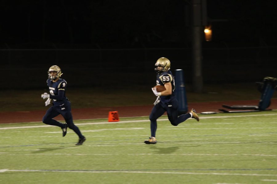 Senior Will Harrell returns a punt for a touchdown.