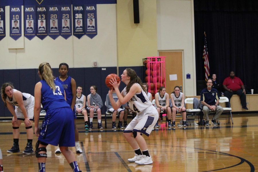 Sophomore Caitlin Cooper shoots a free throw.