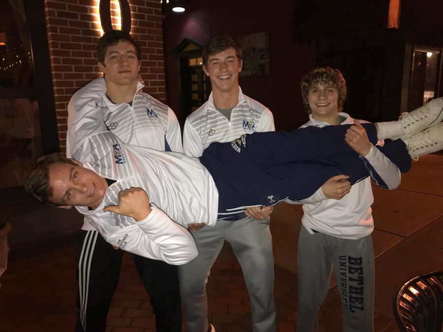 The MCA wrestlers who qualified for Prep Nationals pose for a funny picture during their intense weekend of wrestling.