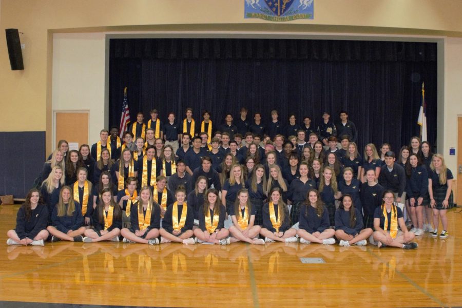 NHS+former+and+new+inductees+pose+for+a+picture+after+the+NHS+Induction+ceremony.+