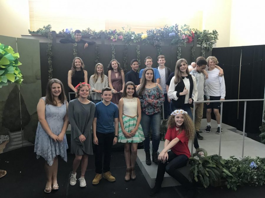 The Middle School Drama Department poses for a photo after a showing of their play A Midsummer Nights Dream.
