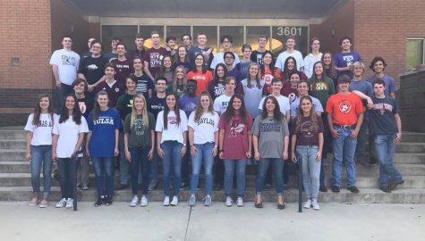After senior chapel, the students take their final picture in their college shirts in front of the Student Life Center.