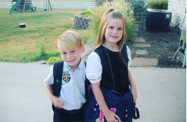 Siblings Maddie and Nate Gywnn pose before their first day back to school.