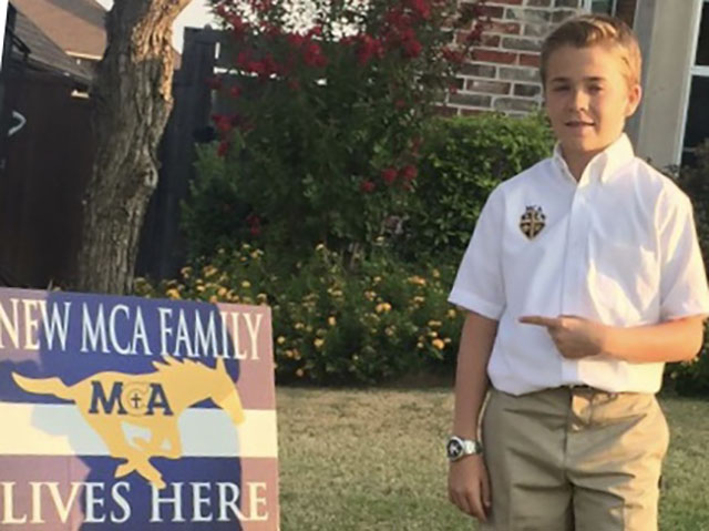 Trey Faulkner poses before his first day at MCA in ninth grade.