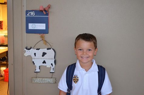 Marshall Stubbs takes a picture before his first day of 3rd grade.