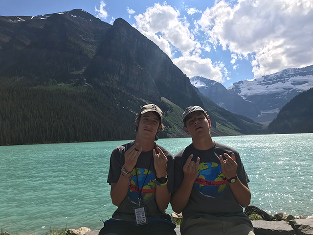Posing with his church friend Davis in front of Lake Louise, senior Mason Lee went on a mission trip this summer to Canada.