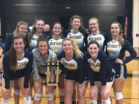 The Lady Mustangs pose with their trophy after finishing second in their own MCA Tournament of Champions