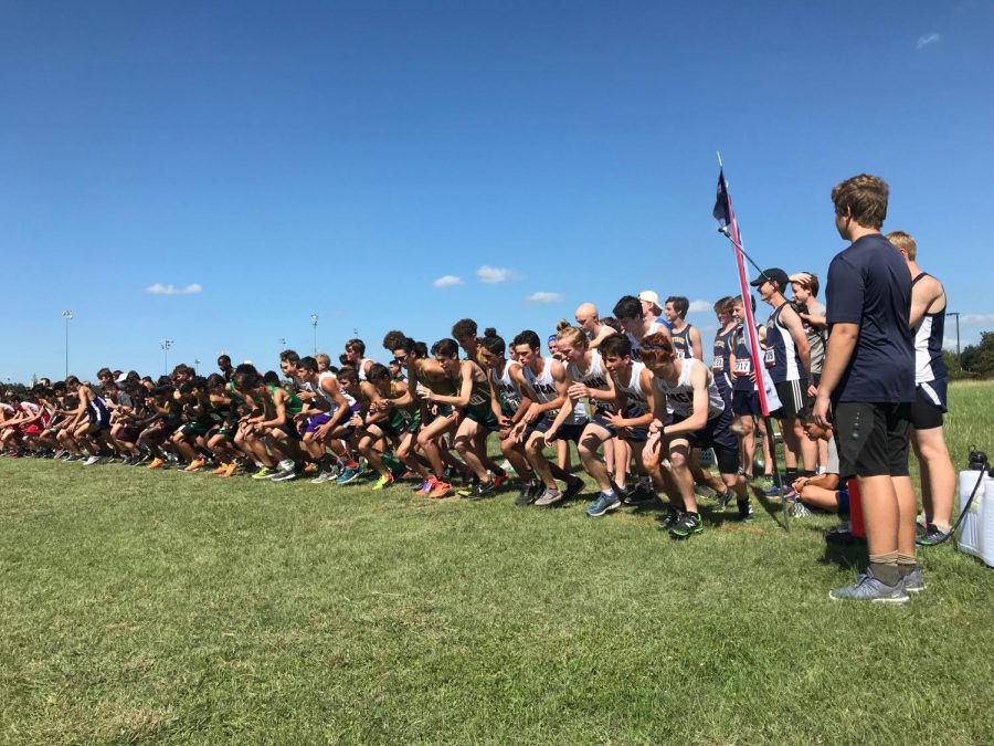 The Varsity Boys are lined up at the starting line at Stephenville, eagerly awaiting the sound of the gun.