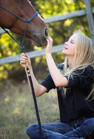 Sophomore Lily Pierce loves and takes care of her house Heidi.