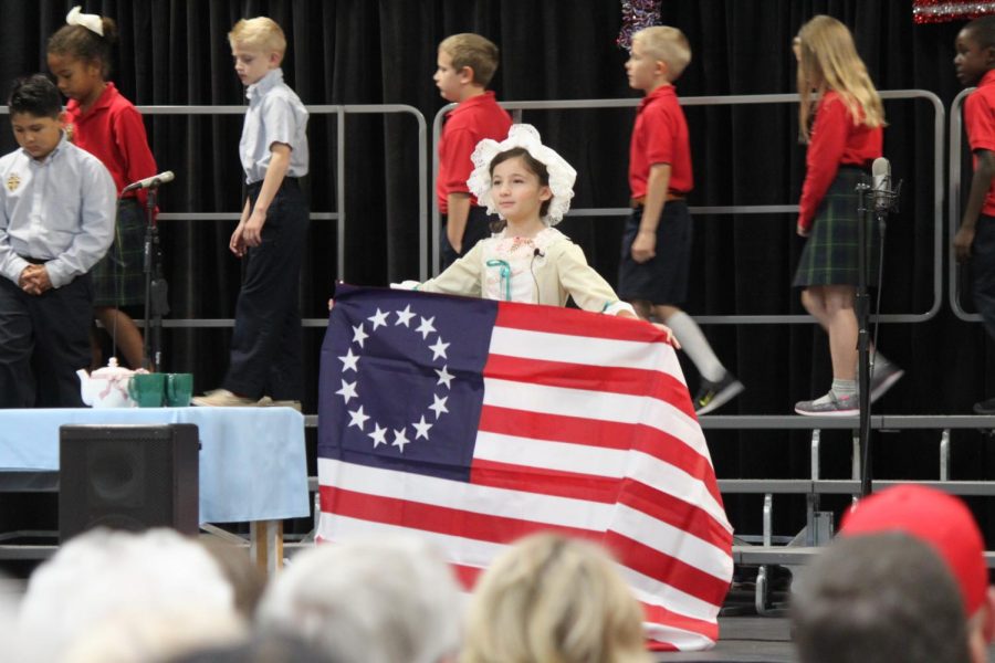 Third Grader Bella Tucker played the role of Betsy Ross in the Grandparents Day program. 