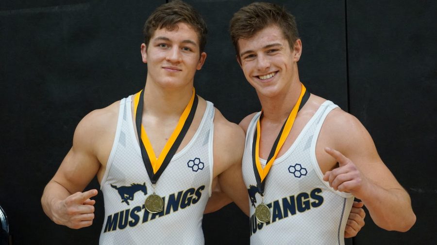Senior Captain Rex Collins and Senior Captain Caleb Doyle pose for a photo after winning gold at the Fossil Ridge Tournament.