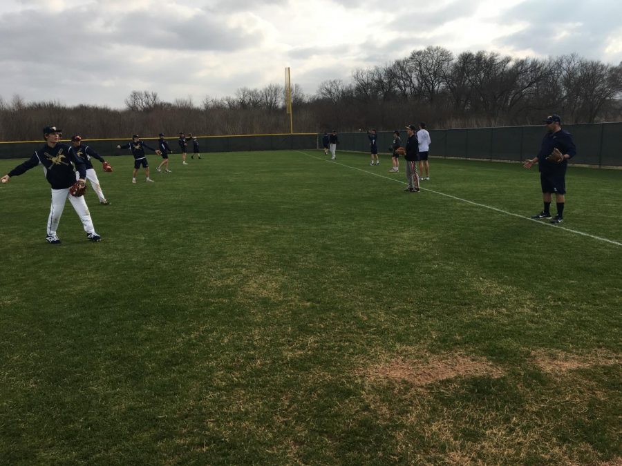 At the beginning of practice, the team warms up together by playing catch.