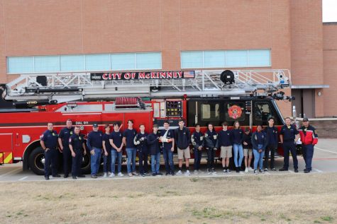 The Teen CERT class gathers in front of a visiting fire truck for a picture. Firemen and paramedics from Station 2 visited MCA to teach the Teen CERT class emergency first aid and how to properly care for the injured.