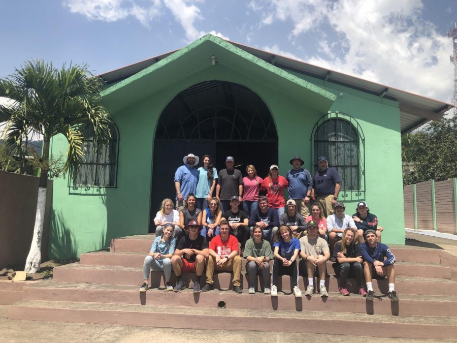 The MCA Guatemala Mission Team poses for a photo outside a church in the village of Zapote.