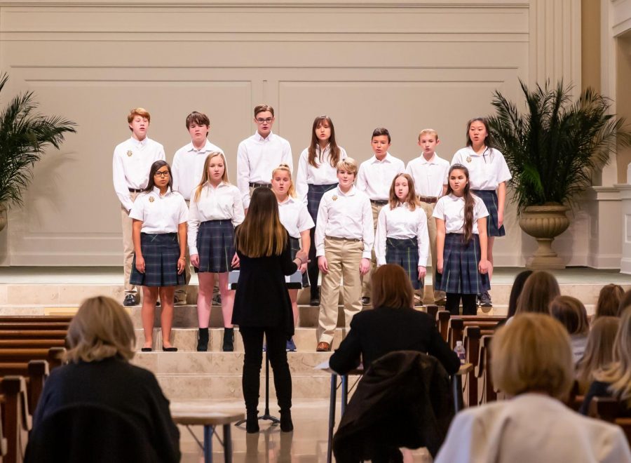 The Middle school choir performs their songs for the judges at the ACSI competition.