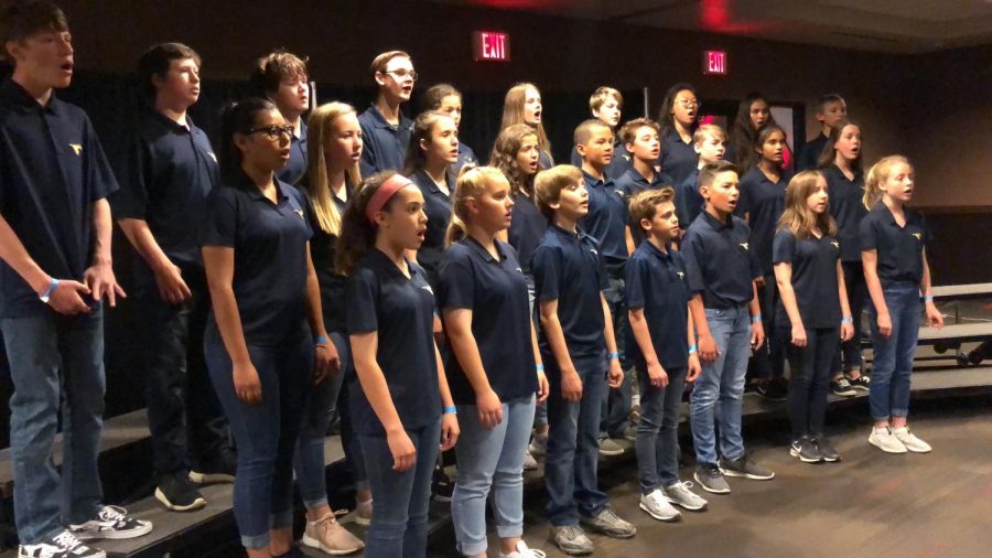 Middle school combined choir sings Festival Alleluia at the Pride of Texas fine arts festival.