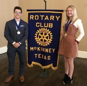 Seniors Graham Kraft and Scout Mayberry are honored at the McKinney Rotary Club spring meeting. 