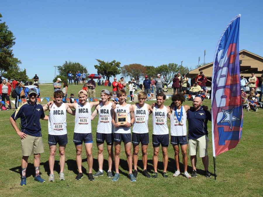 The Mustangs show off their third place finish at state after a successful XC season.