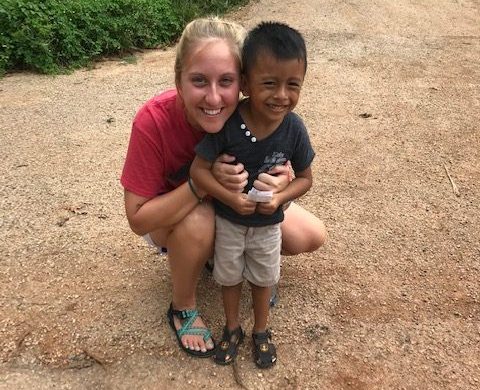 New teacher and coach Brandi Goforth poses for a picture with one of her missionary kids. 