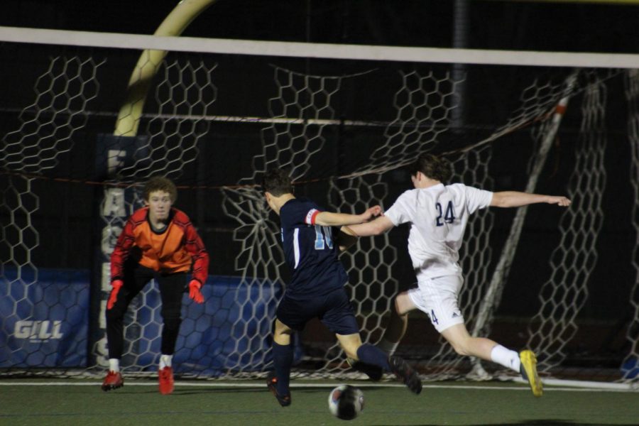 Freshman goalie Cole Anderson gets in position to block the ball