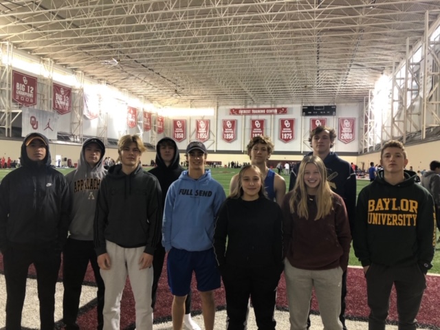 The MCA Indoor Track  Team takes another memorable photo upon arrival to OU.