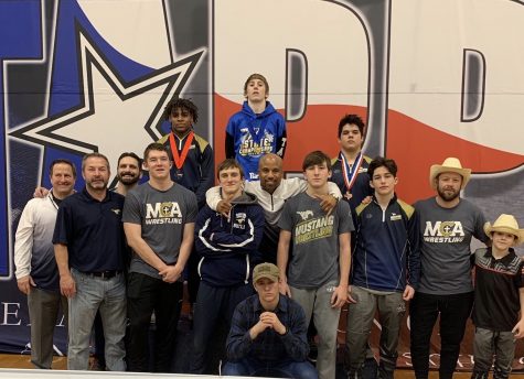 The 2020 varsity wrestling team after TAPPS State Competition.