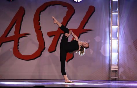 Brooke Jensen competing with a solo dance at competition.