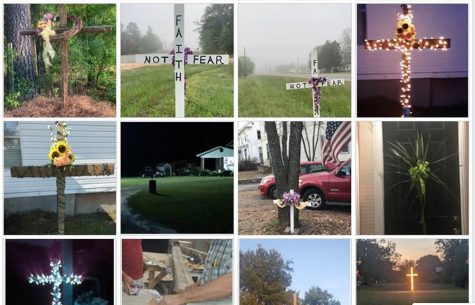 People are placing wooden crosses in their front yard to express 'Faith Not Fear.'