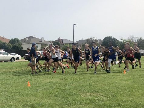 Boys cross country team starts relay