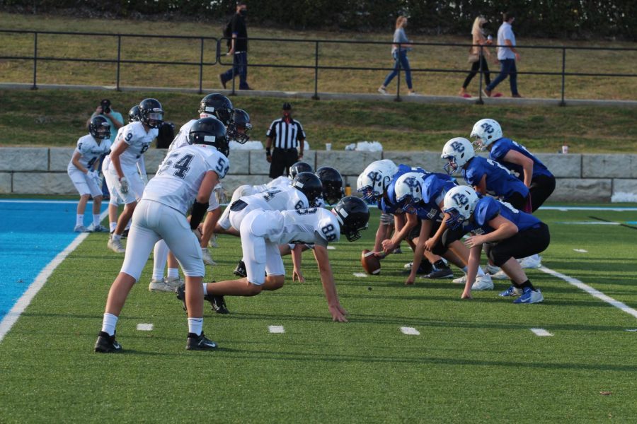 The Mustang defense tries to stop the Chargers on the goal line. 