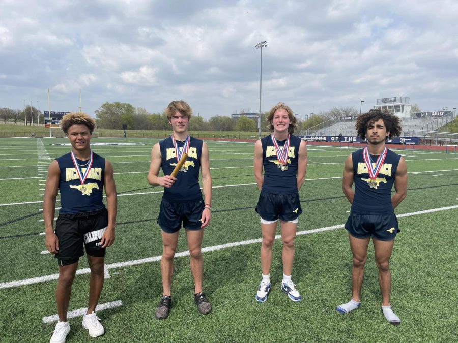 The 4x400 meter team poses for a picture after their first place finish. 
Freshman Noah Wheeler, junior Daniel Kanz, Junior Maddox Pederson and senior Maliq Brock.