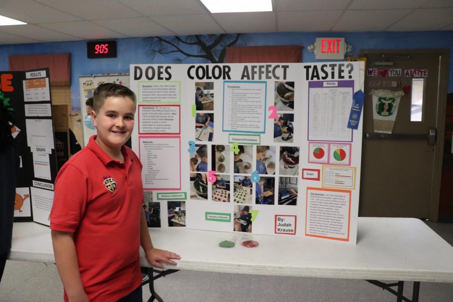 Fifth grader Judah Krause poses with his first place project.