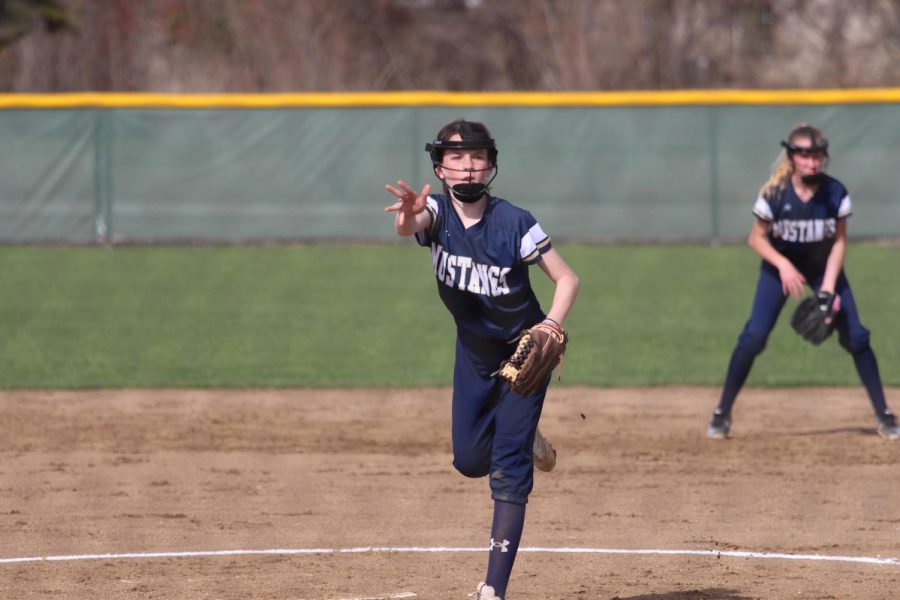 Seventh grader, Sadie Zbranek pitches the ball to the opposing team.