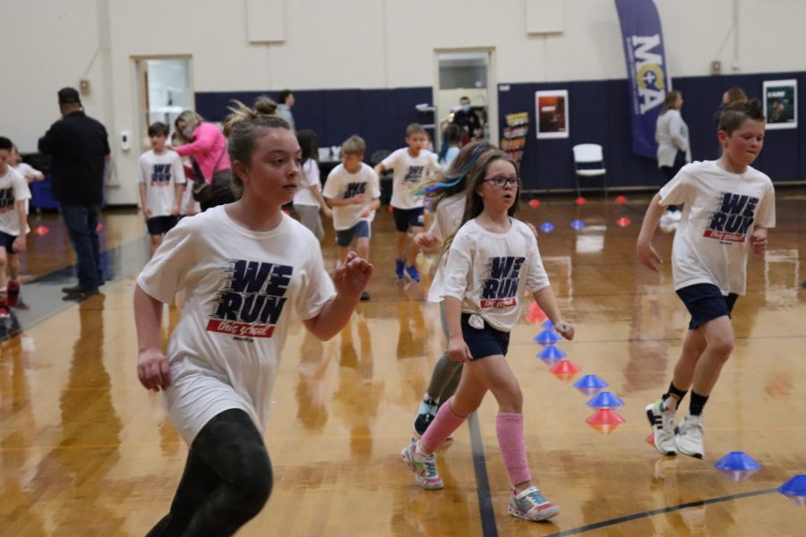 Fourth grade girls were running fast at the BoosterThon fun run.