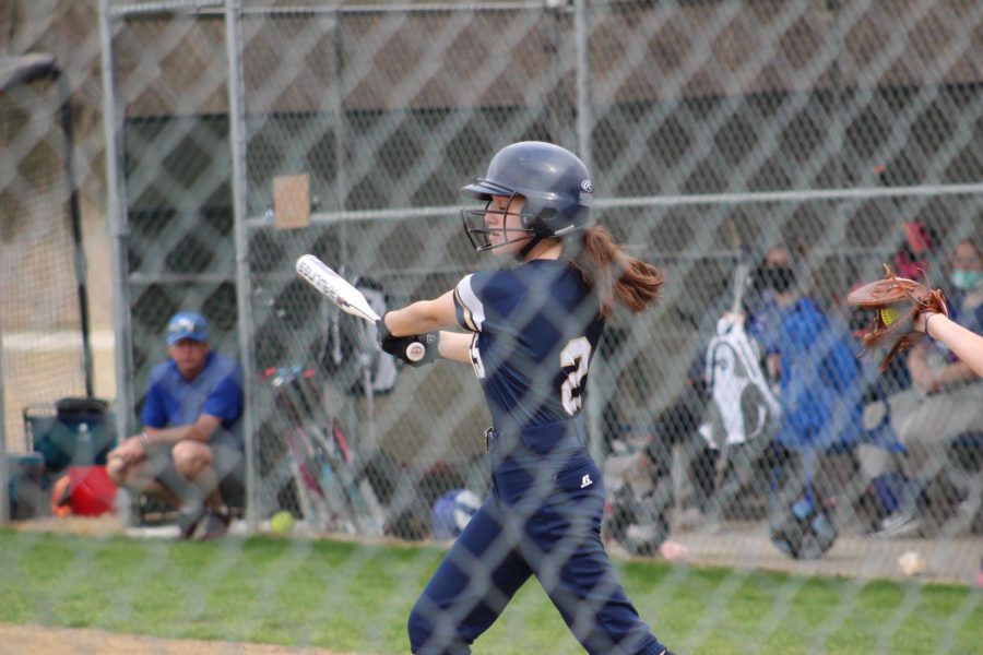8th+grader+Ryan+Tessier+swings+the+bat+looking+to+get+a+hit.