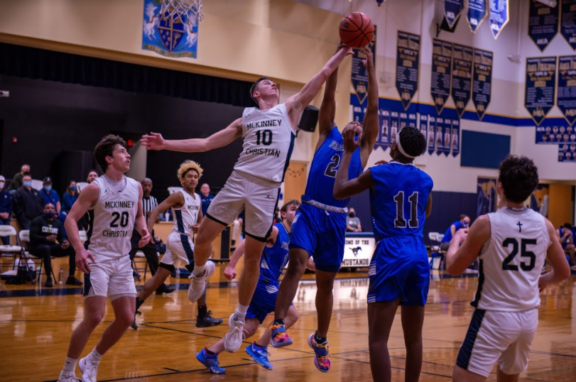 Varsity Boys Basketball Team Secures the First Playoff Win in Team History