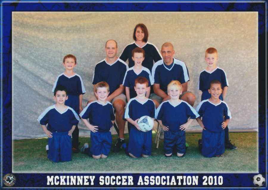 The boys pose for a picture on their first soccer team back in elementary school
