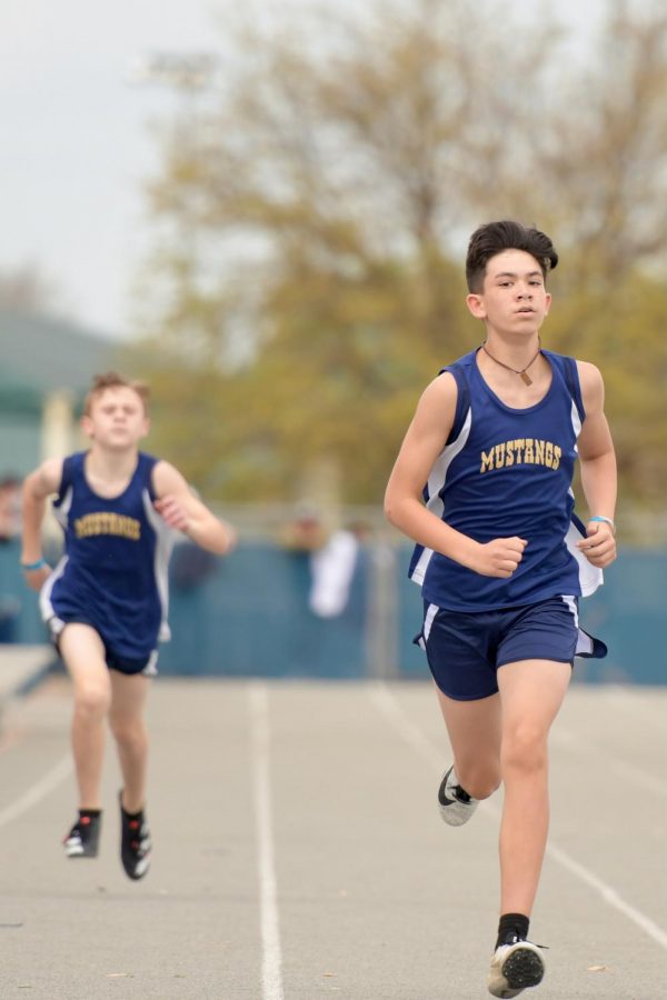 Sixth grader, Joey Gunn looks ahead as he continues his race.