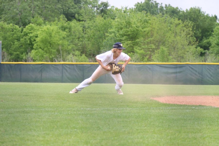 Eighth grader Judd Witte makes the play in the infield.