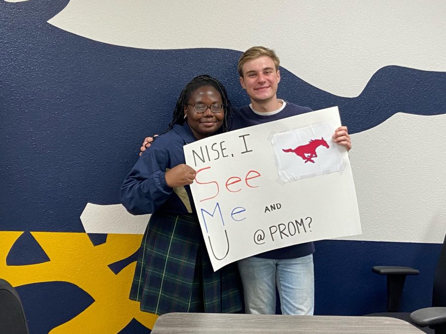 Senior Korey Vita asked senior Nise Olawale with a SMU poster at lunch one day during school. 