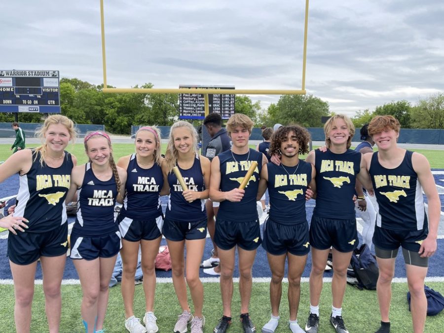 The MCA boys and girls relay teams pose for a picture after qualifying for the state meet.