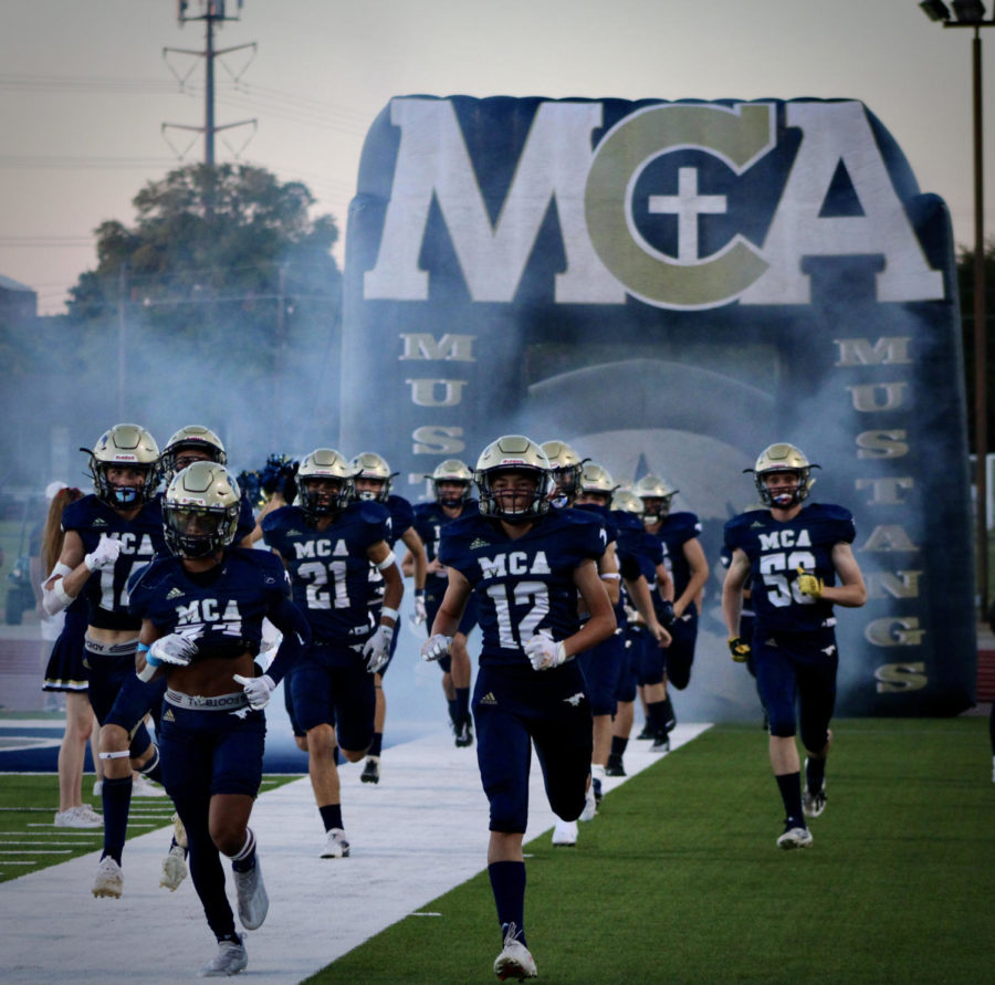 The McKinney Mustangs ran out of the tunnel, ready to take on Westlake.  