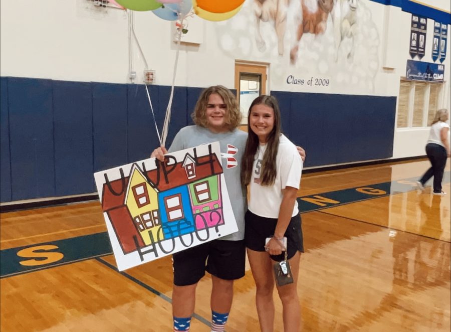 Junior Matthew McDowell asked Junior Sarah Krusing after a home volleyball game.