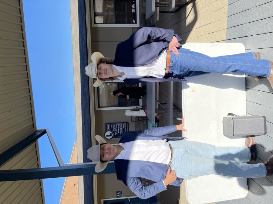 Seniors Grant Hursh and Dalton Sanders dressed up as cowboys and took pictures with customers.