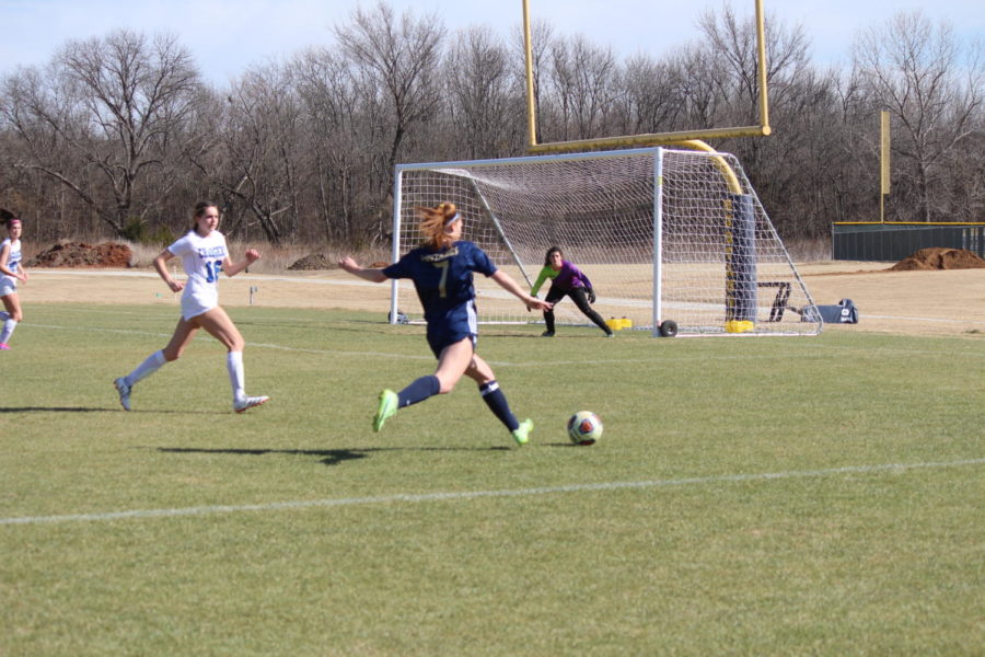Sophomore Ava Thompson takes a shot from inside the 18 yard box.