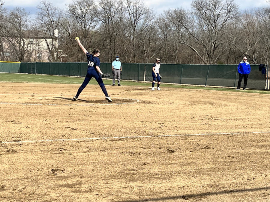 Sixth grader Harper Johnson pitches the ball to the opposing team. 