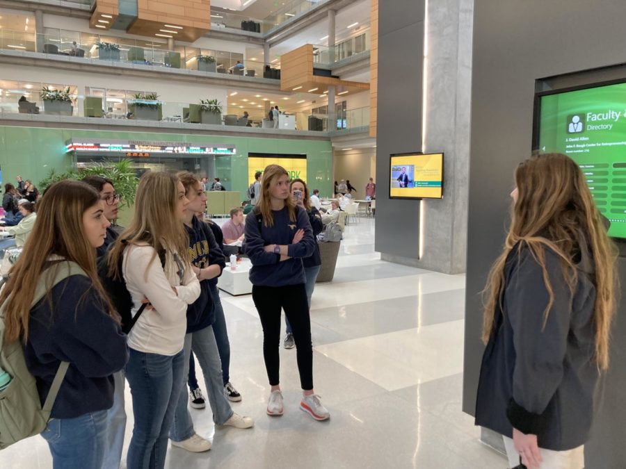 Juniors listen to their tour guide as she explains what goes on in the business building at Baylor.